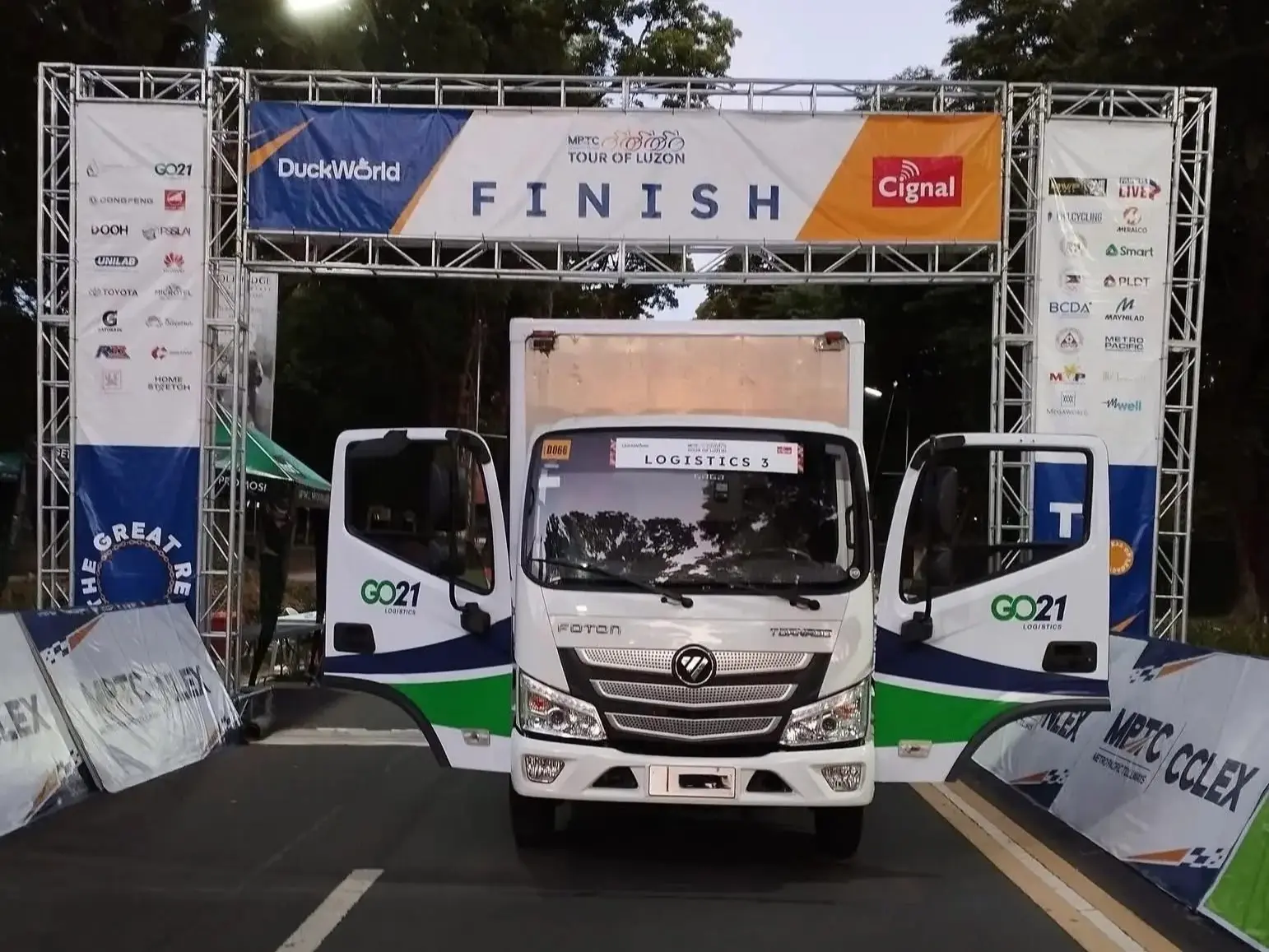 A truck with the GO21 logo at the finish line of the MPTC Tour of Luzon 2025 event