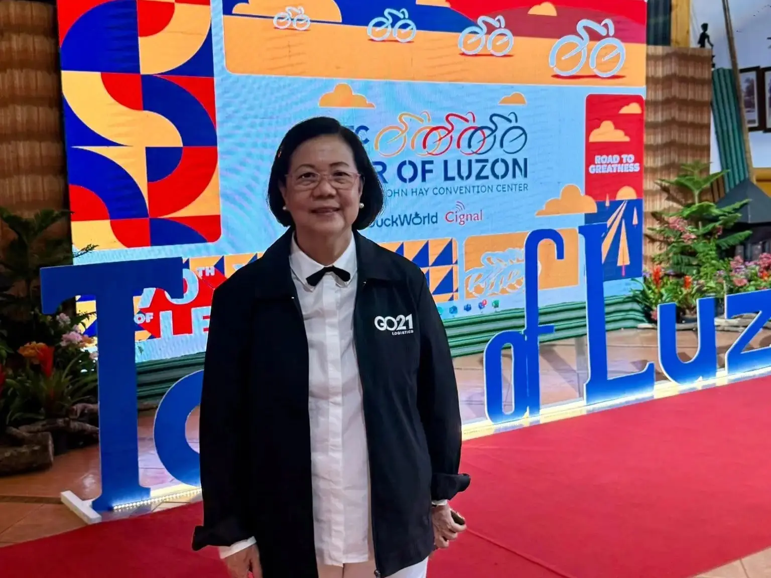 GO21 executive at the MPTC Tour of Luzon 2025 event display